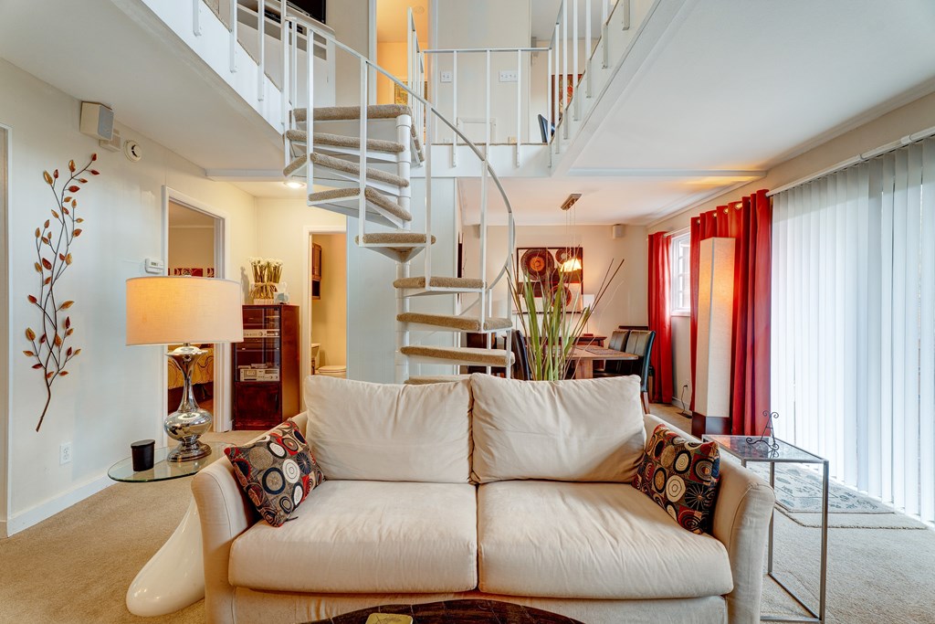 96 Clubhouse Court Ellijay, GA 30536 - Photo 5 of 56 a living room with furniture and a chandelier