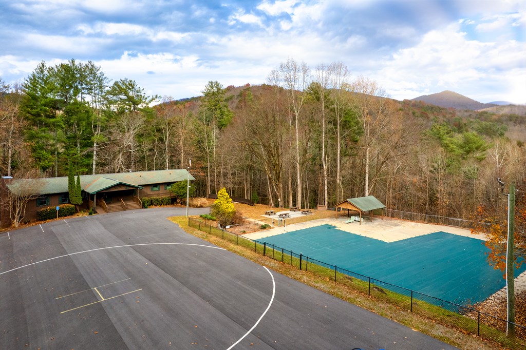 96 Clubhouse Court Ellijay, GA 30536 - Photo 8 of 56 a view of a patio with a table and chairs