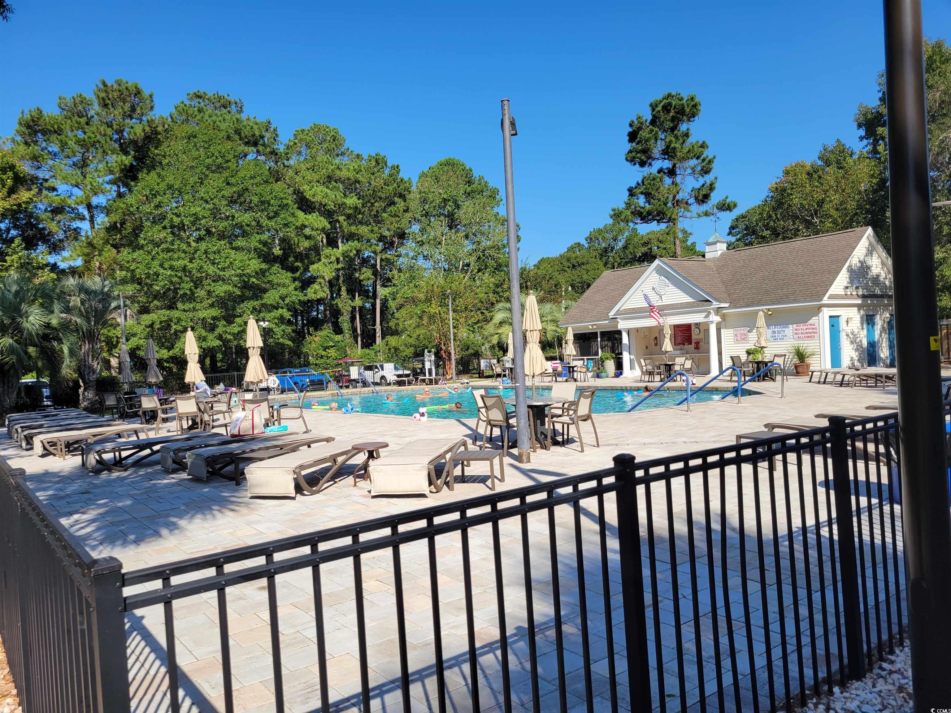 1481 Riceland Court Murrells Inlet, SC 29576 - Photo 30 of 30 View of swimming pool with a patio