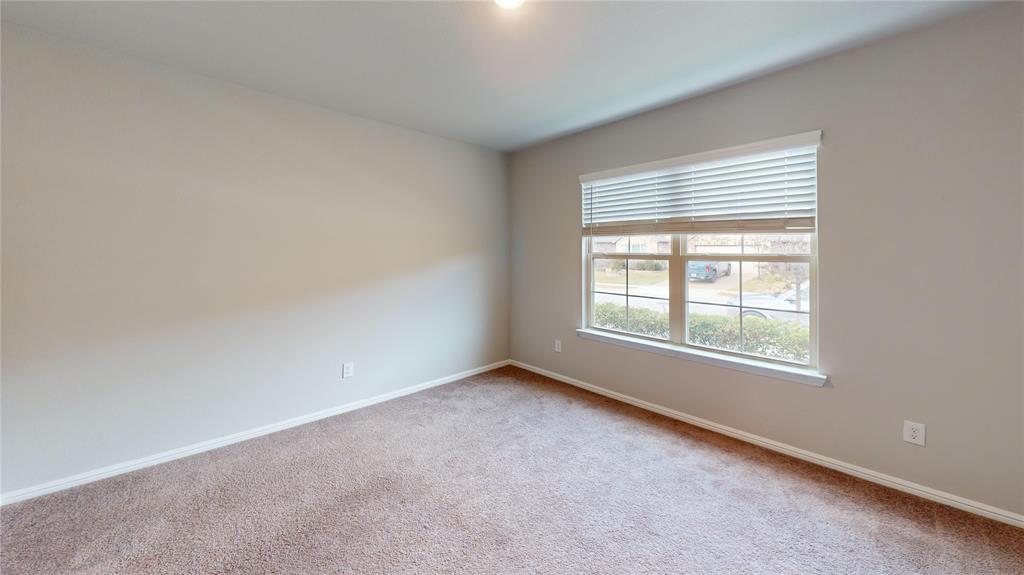 214 Crescent Avenue Melissa, TX 75454 - Photo 11 of 17 an empty room with a window