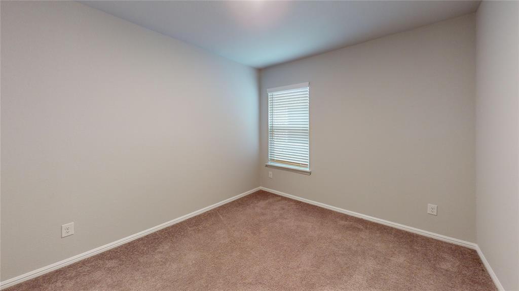 214 Crescent Avenue Melissa, TX 75454 - Photo 12 of 17 an empty room with windows