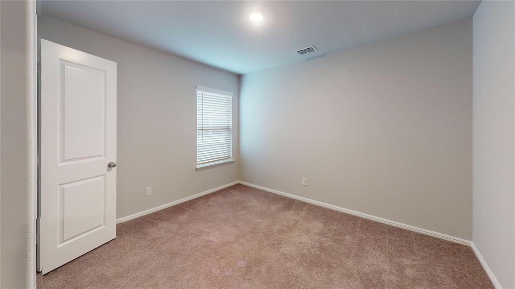 214 Crescent Avenue Melissa, TX 75454 - Photo 13 of 17 a view of an empty room with a window
