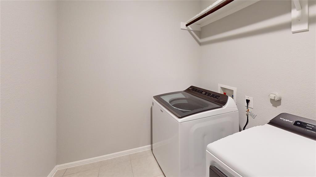 214 Crescent Avenue Melissa, TX 75454 - Photo 16 of 17 a utility room with dryer and washer