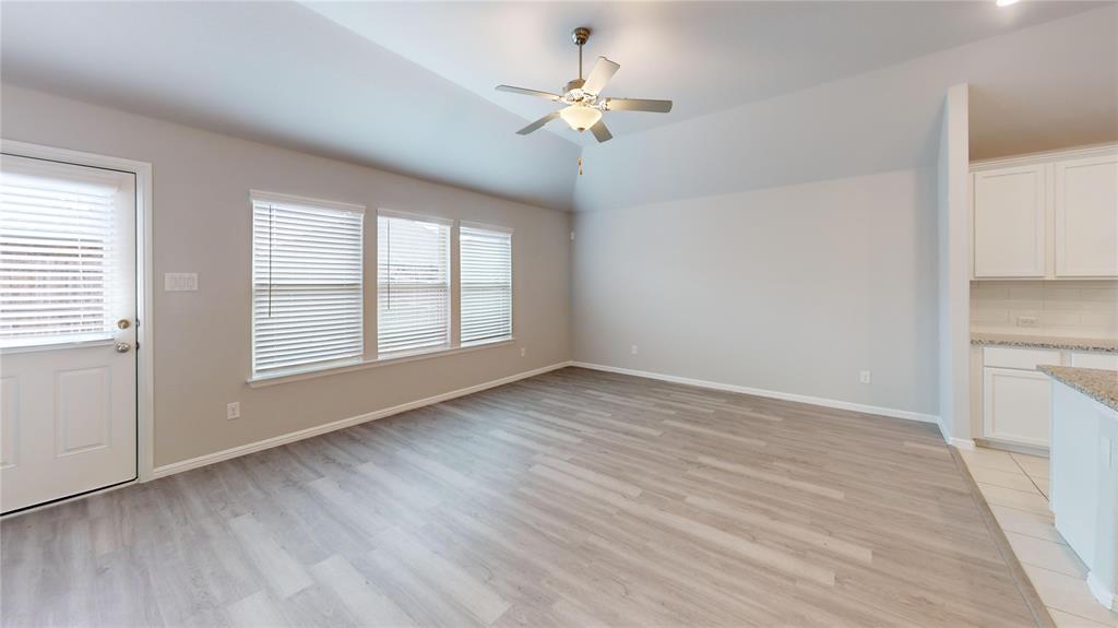 214 Crescent Avenue Melissa, TX 75454 - Photo 3 of 17 wooden floor in an empty room with a window