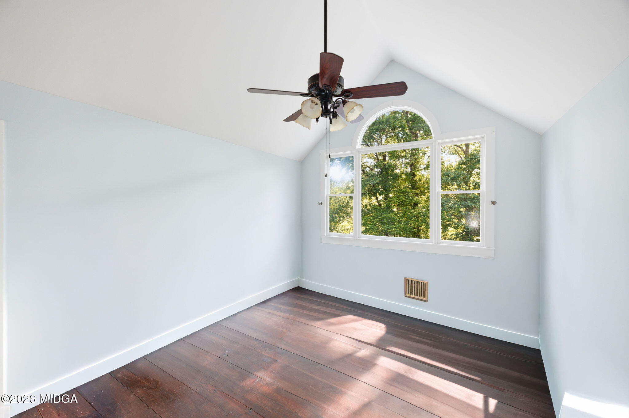 4686 Johnstonville Road Forsyth, GA 31029 - Photo 20 of 34 an empty room with windows