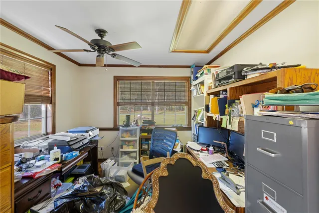 a bathroom with a granite countertop sink a toilet and shower