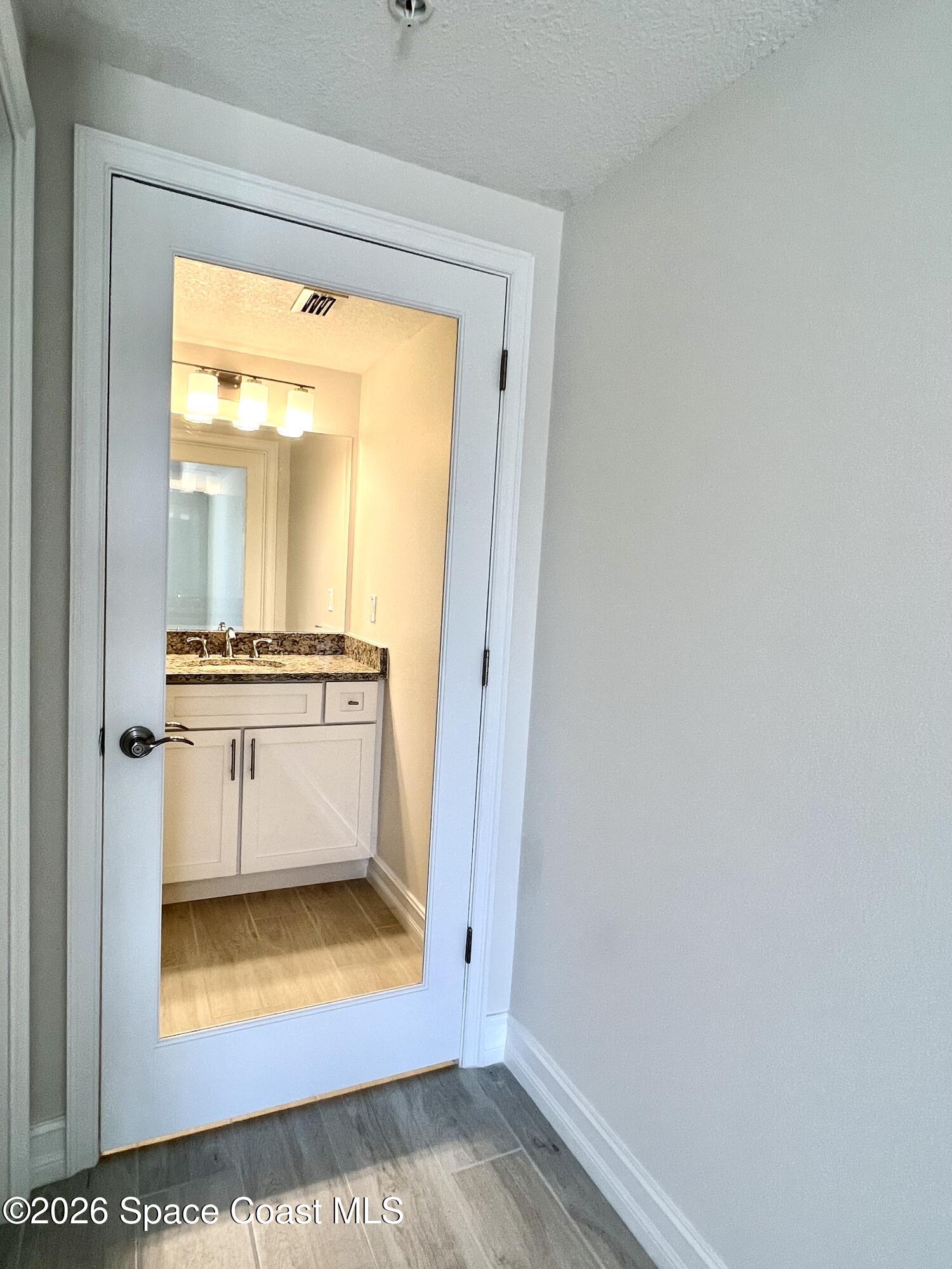 1825 Riverside Drive, Unit 204 Titusville, FL 32780 - Photo 17 of 29 a view of kitchen with an oven
