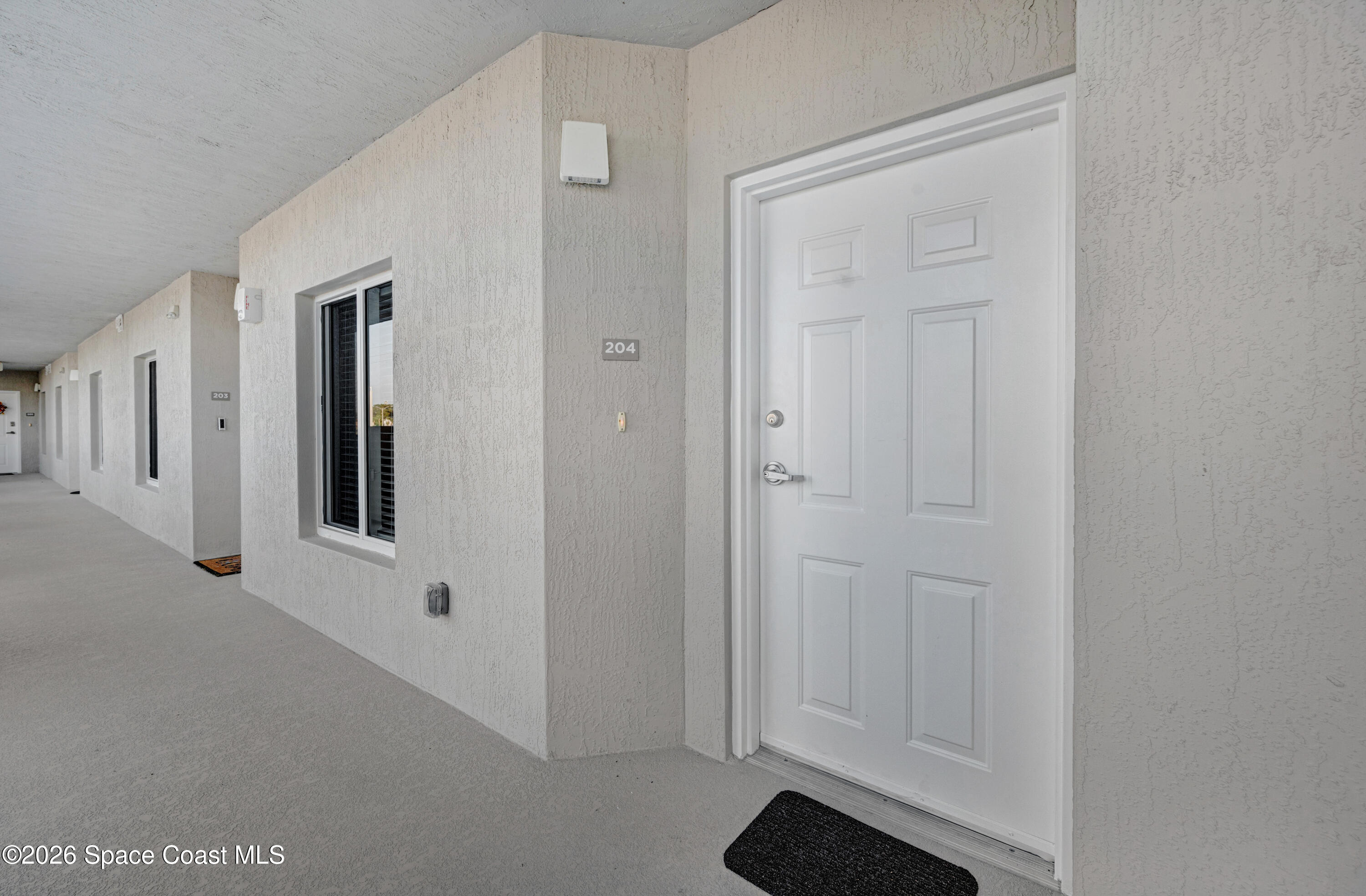 1825 Riverside Drive, Unit 204 Titusville, FL 32780 - Photo 6 of 29 a view of a livingroom with an empty space