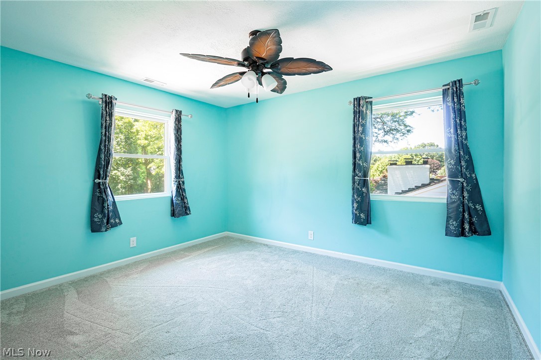 2055 Ganyard Road Akron, OH 44313 - Photo 24 of 49 Bedroom with carpet and ceiling fan