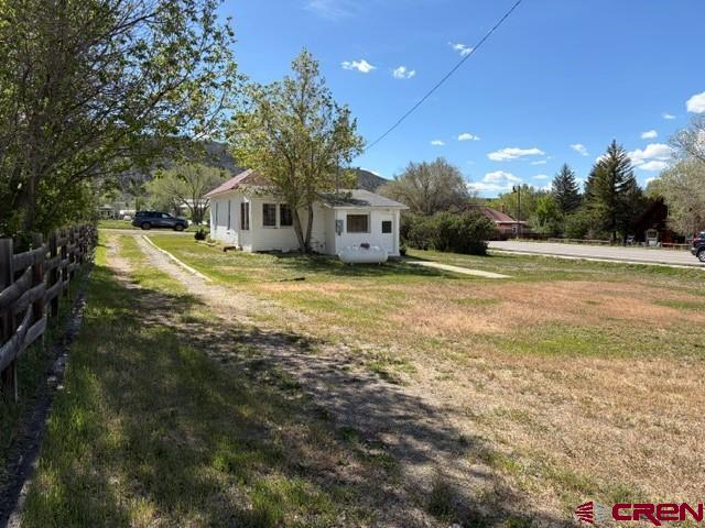 116 South Mary Street Ridgway, CO 81432 - Photo 20 of 23 a front view of a house with a yard