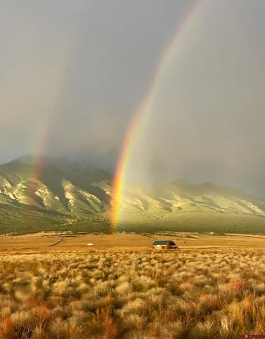 a view of a lake with a city