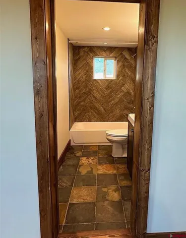 a view of a room with a large window