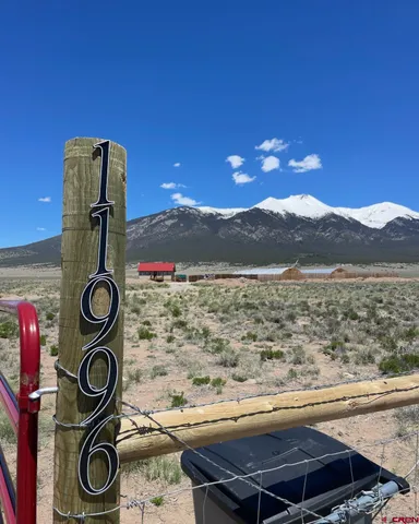 a view of sunset and a yard