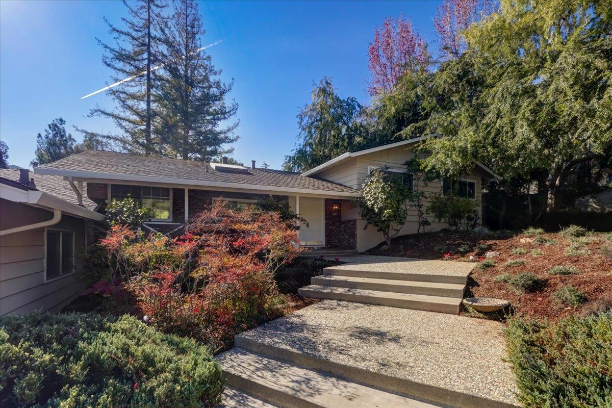 1276 Echo Valley Drive San Jose, CA 95120 - Photo 2 of 54 a front view of house with yard and trees around