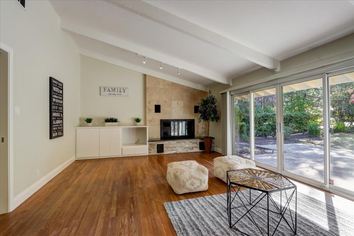 1276 Echo Valley Drive San Jose, CA 95120 - Photo 22 of 54 a living room with furniture and a wooden floor