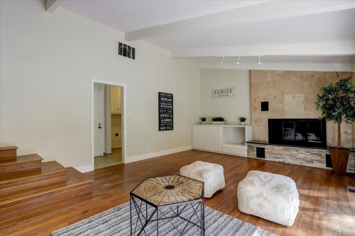 1276 Echo Valley Drive San Jose, CA 95120 - Photo 23 of 54 a living room with furniture and a fireplace
