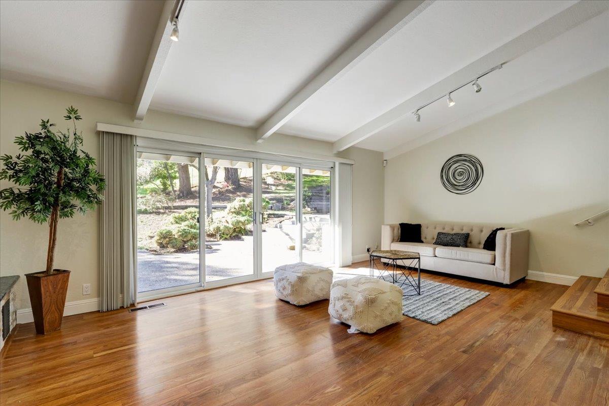 1276 Echo Valley Drive San Jose, CA 95120 - Photo 24 of 54 a living room with furniture and a large window