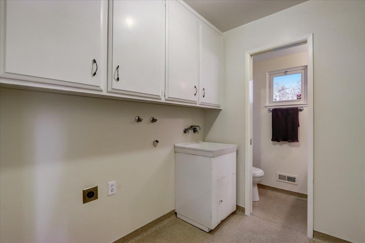1276 Echo Valley Drive San Jose, CA 95120 - Photo 26 of 54 a view of an empty room with a fireplace and cabinet