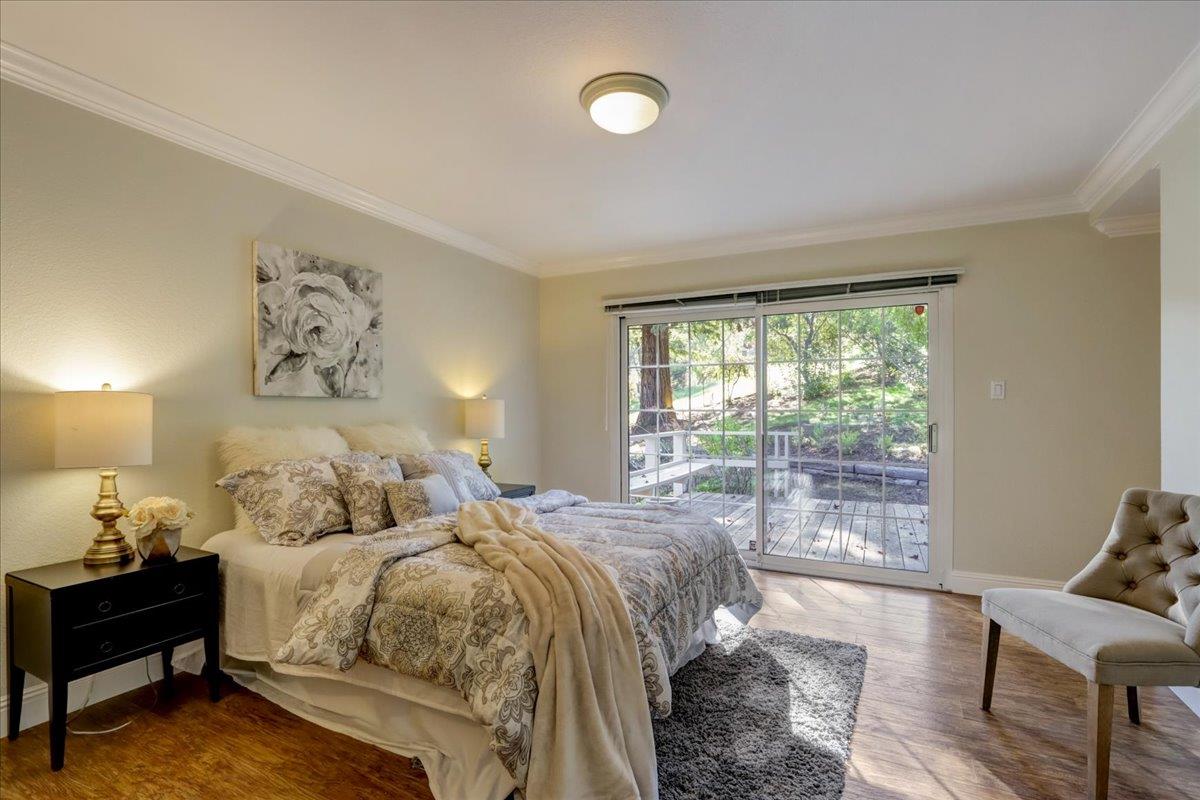 1276 Echo Valley Drive San Jose, CA 95120 - Photo 31 of 54 a bedroom with a bed and a large window