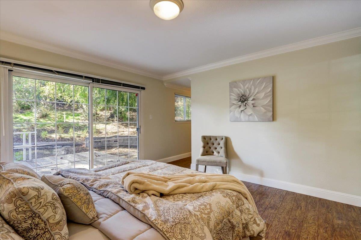 1276 Echo Valley Drive San Jose, CA 95120 - Photo 32 of 54 a bedroom with a bed and a large window
