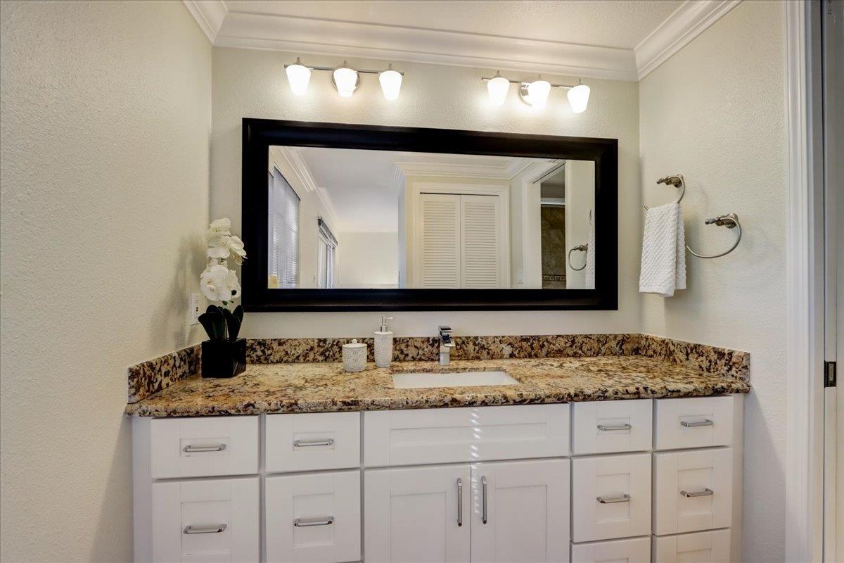 1276 Echo Valley Drive San Jose, CA 95120 - Photo 35 of 54 a bathroom with a sink and a mirror