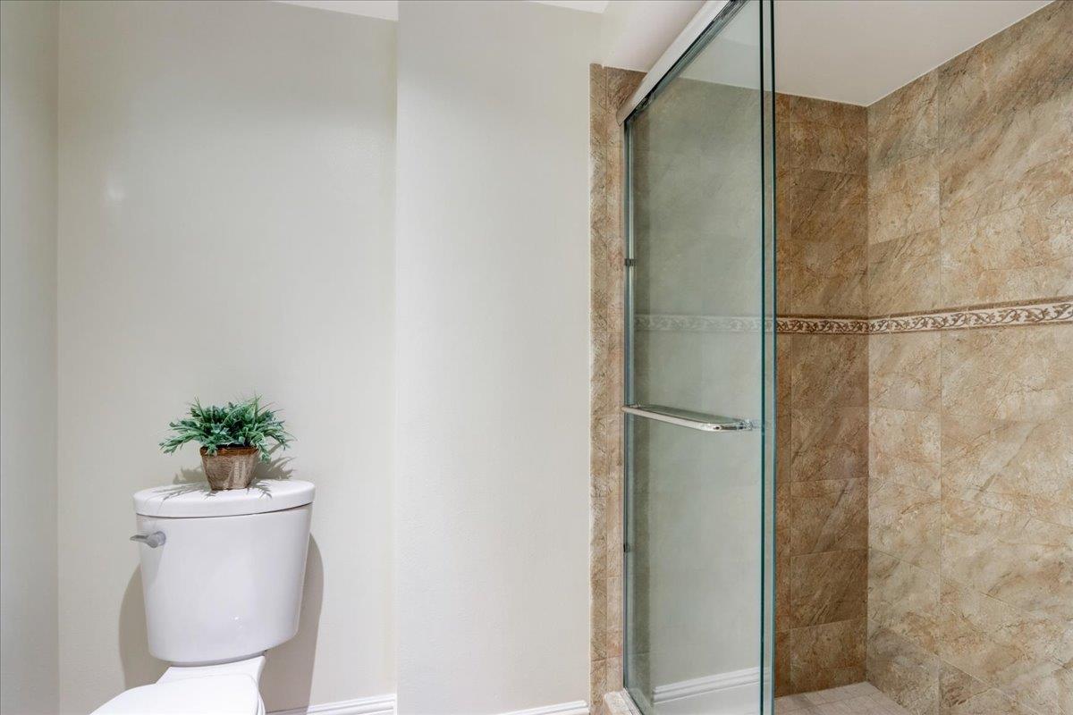 1276 Echo Valley Drive San Jose, CA 95120 - Photo 36 of 54 a white toilet sitting next to a shower