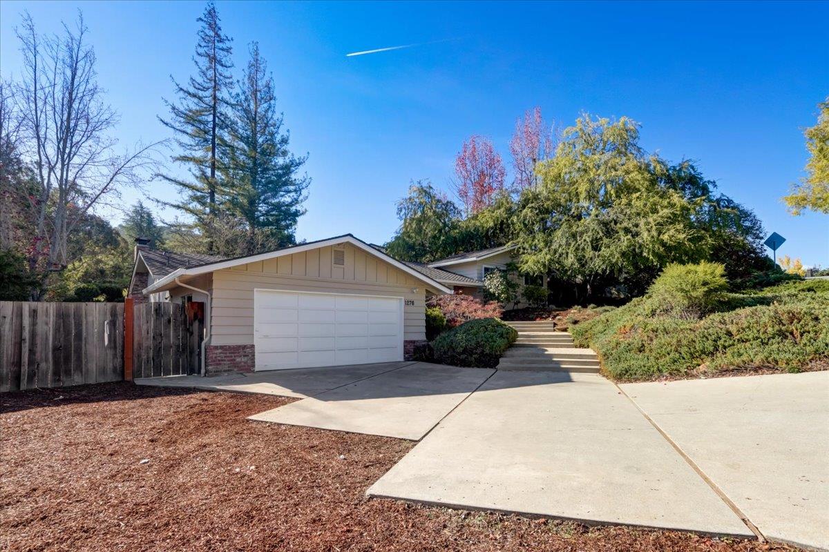 1276 Echo Valley Drive San Jose, CA 95120 - Photo 6 of 54 a view of a house with a yard