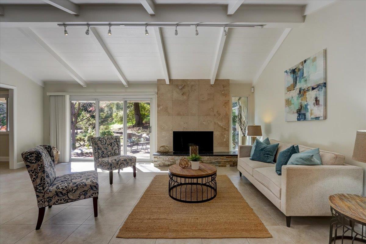 1276 Echo Valley Drive San Jose, CA 95120 - Photo 7 of 54 a living room with furniture and a fireplace