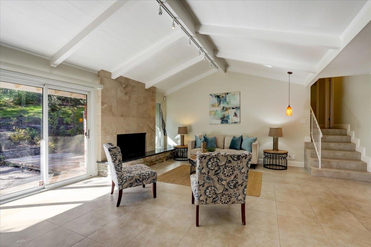 1276 Echo Valley Drive San Jose, CA 95120 - Photo 9 of 54 a living room with furniture and a fireplace