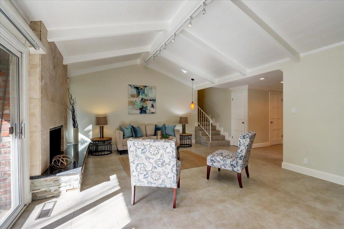 1276 Echo Valley Drive San Jose, CA 95120 - Photo 10 of 54 a living room with furniture and a flat screen tv