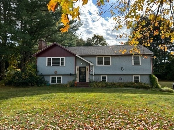 66 Birch Meadow Road Merrimac, MA 01860 - Photo 1 of 19 a view of a house with a yard