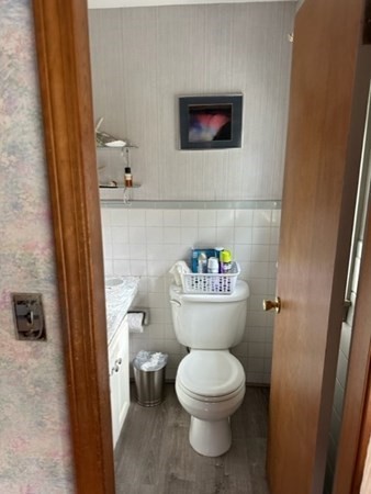 66 Birch Meadow Road Merrimac, MA 01860 - Photo 15 of 19 a white toilet sitting next to a bathroom sink