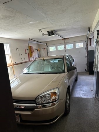66 Birch Meadow Road Merrimac, MA 01860 - Photo 16 of 19 a car parked in a garage