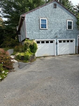 66 Birch Meadow Road Merrimac, MA 01860 - Photo 2 of 19 a front view of a house with a yard