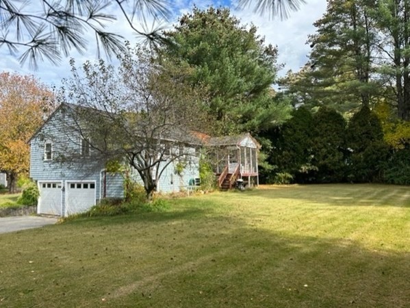 66 Birch Meadow Road Merrimac, MA 01860 - Photo 4 of 19 a view of a house with a yard
