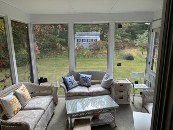 66 Birch Meadow Road Merrimac, MA 01860 - Photo 10 of 19 a living room with furniture and a large window