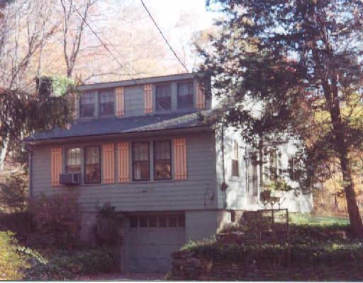 544 Judd Road Easton, CT 06612 - Photo 1 of 1 a front view of a house with a yard