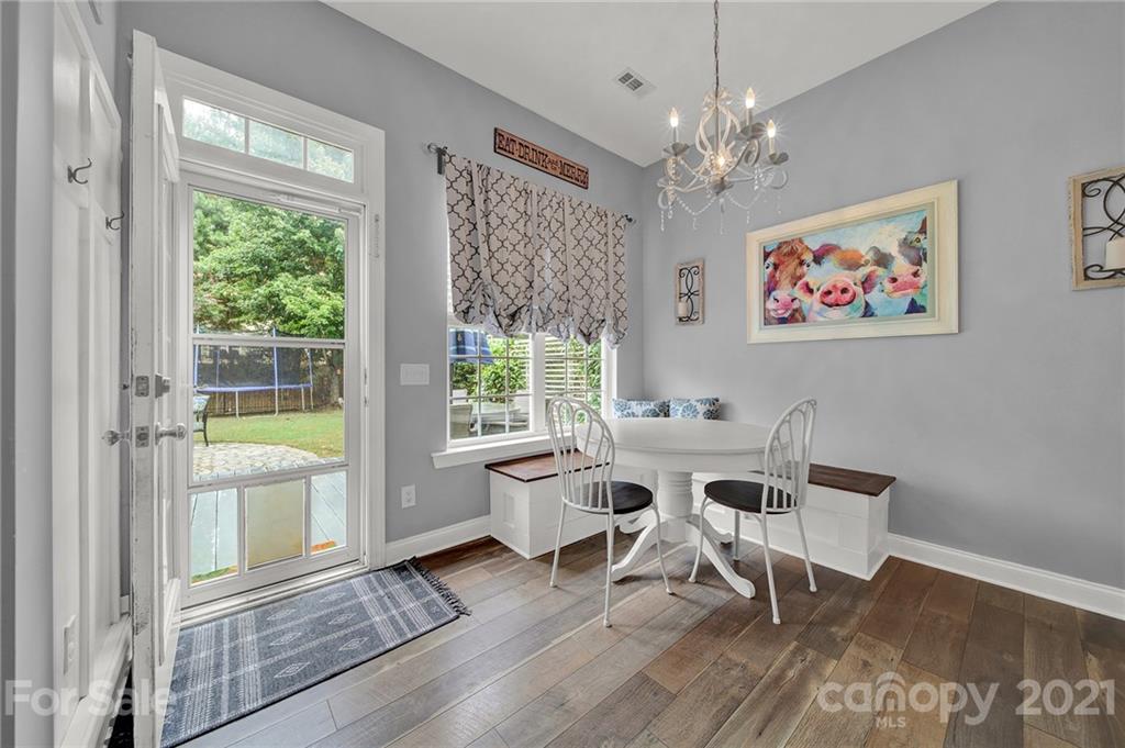 324 Miners Cove Way Fort Mill, SC 29708 - Photo 11 of 48 a living room with furniture and a large window