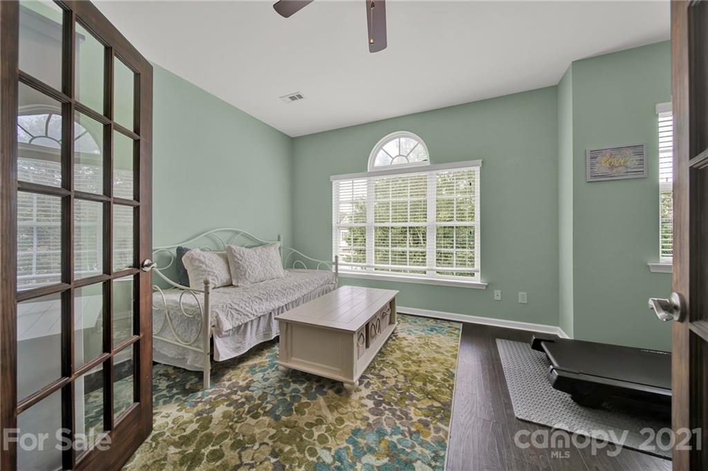 324 Miners Cove Way Fort Mill, SC 29708 - Photo 29 of 48 a living room with furniture and a window