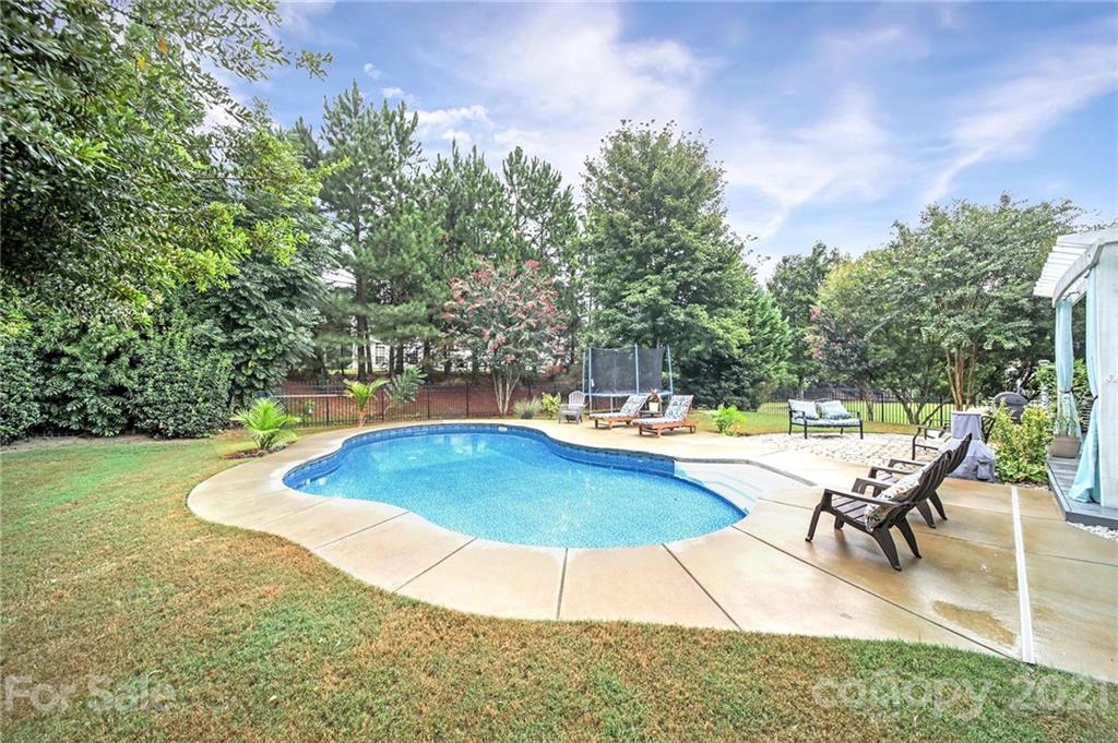 324 Miners Cove Way Fort Mill, SC 29708 - Photo 40 of 48 a view of a swimming pool with an outdoor seating