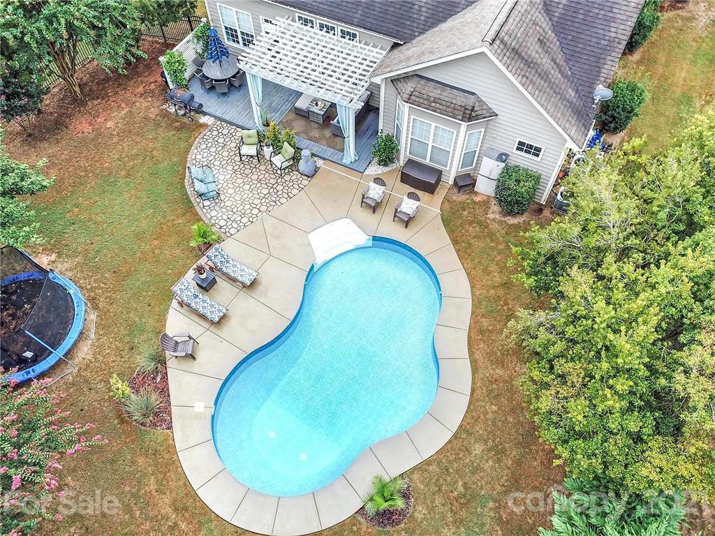 324 Miners Cove Way Fort Mill, SC 29708 - Photo 42 of 48 an aerial view of a house with swimming pool and sitting area