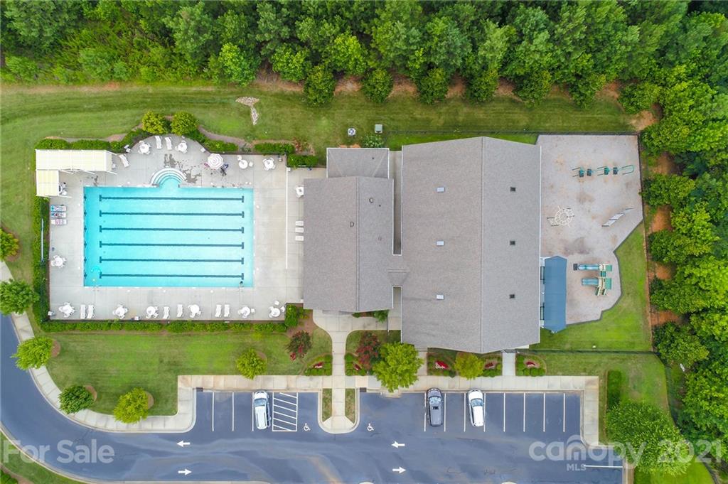 324 Miners Cove Way Fort Mill, SC 29708 - Photo 46 of 48 an aerial view of a house with a garden and lake view