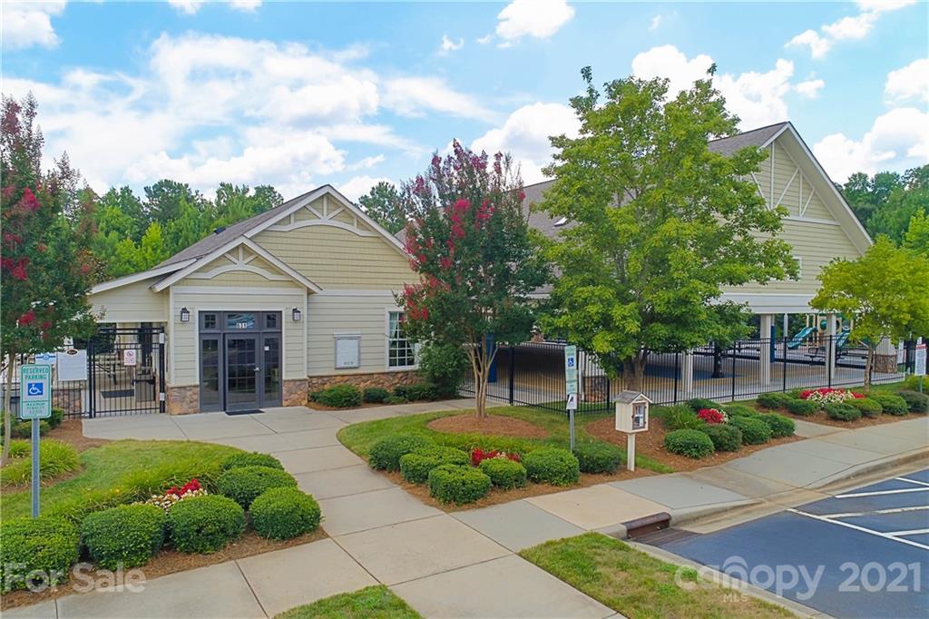 324 Miners Cove Way Fort Mill, SC 29708 - Photo 47 of 48 a front view of house with yard and green space