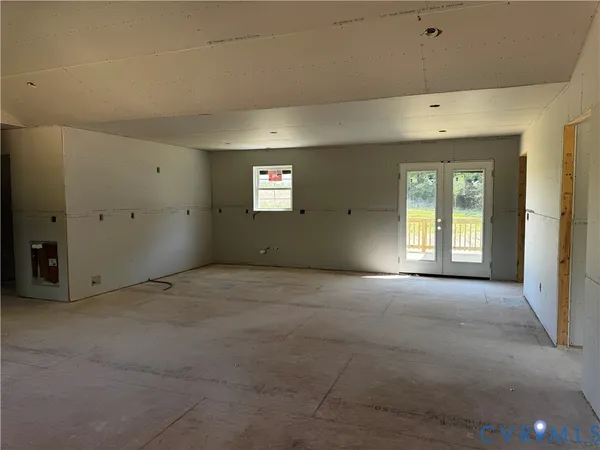an empty room with windows