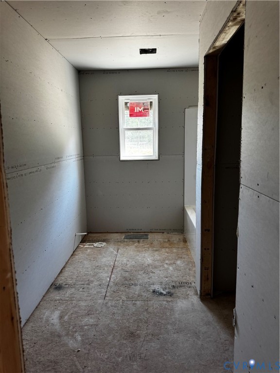 11051 Easy Street Disputanta, VA 23842 - Photo 10 of 11 an empty room with windows