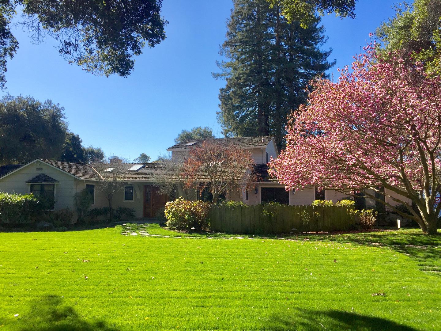 154 Greenoaks Drive Atherton, CA 94027 - Photo 1 of 1 a view of a big yard next to a house