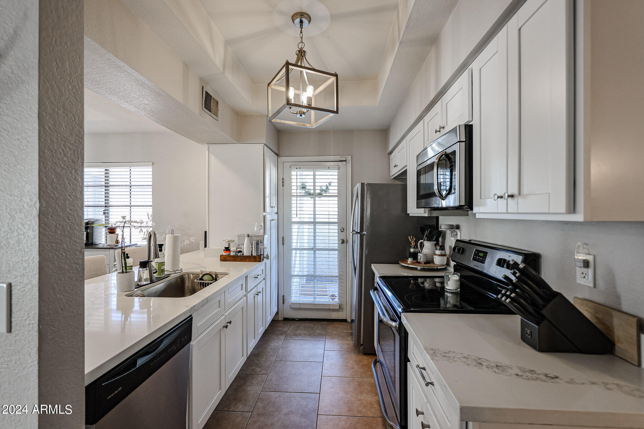 1222 West Baseline Road, Unit 108 Tempe, AZ 85283 - Photo 5 of 18 Kitchen with Patio