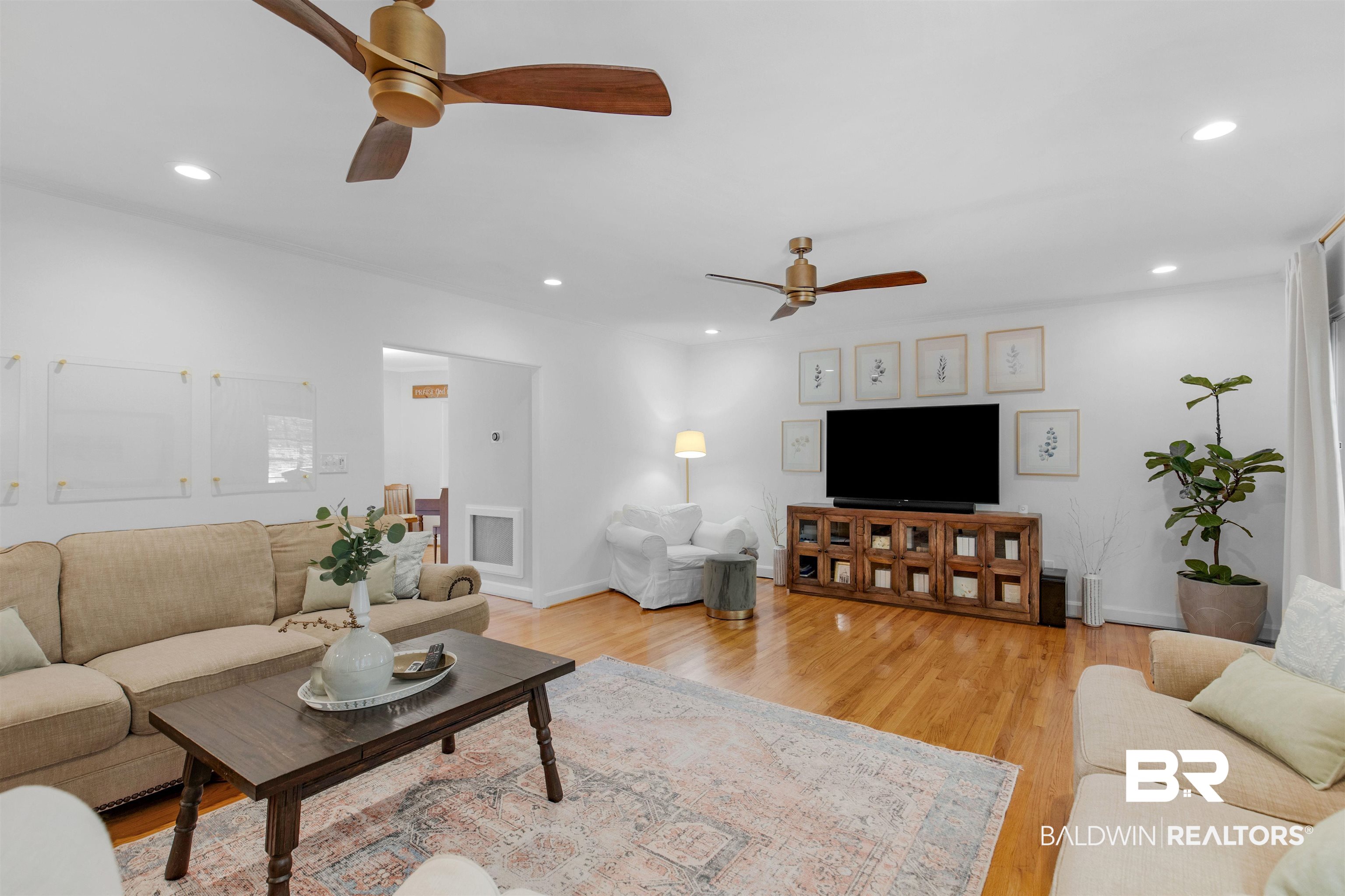 4306 Michael Boulevard Mobile, AL 36609 - Photo 9 of 35 Living room featuring light hardwood / wood-style floors and ceiling fan