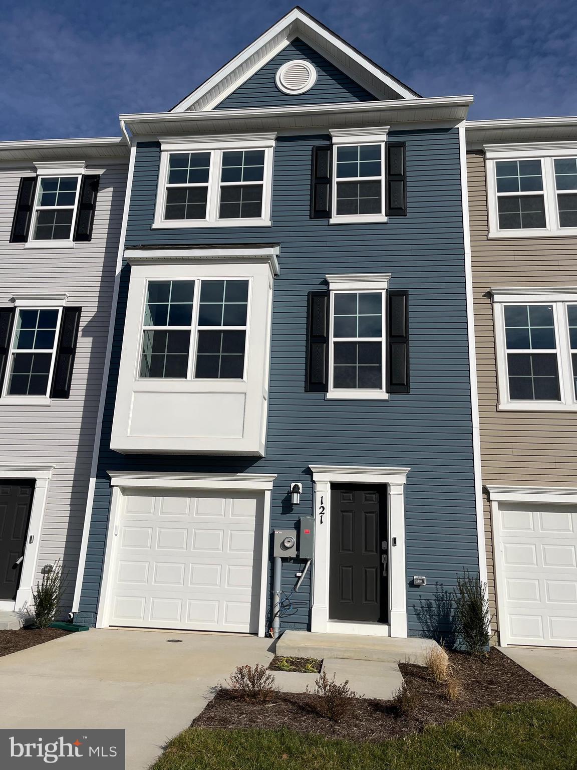 121 Canning Road Inwood, WV 25428 - Photo 1 of 38 a front view of a house with a yard