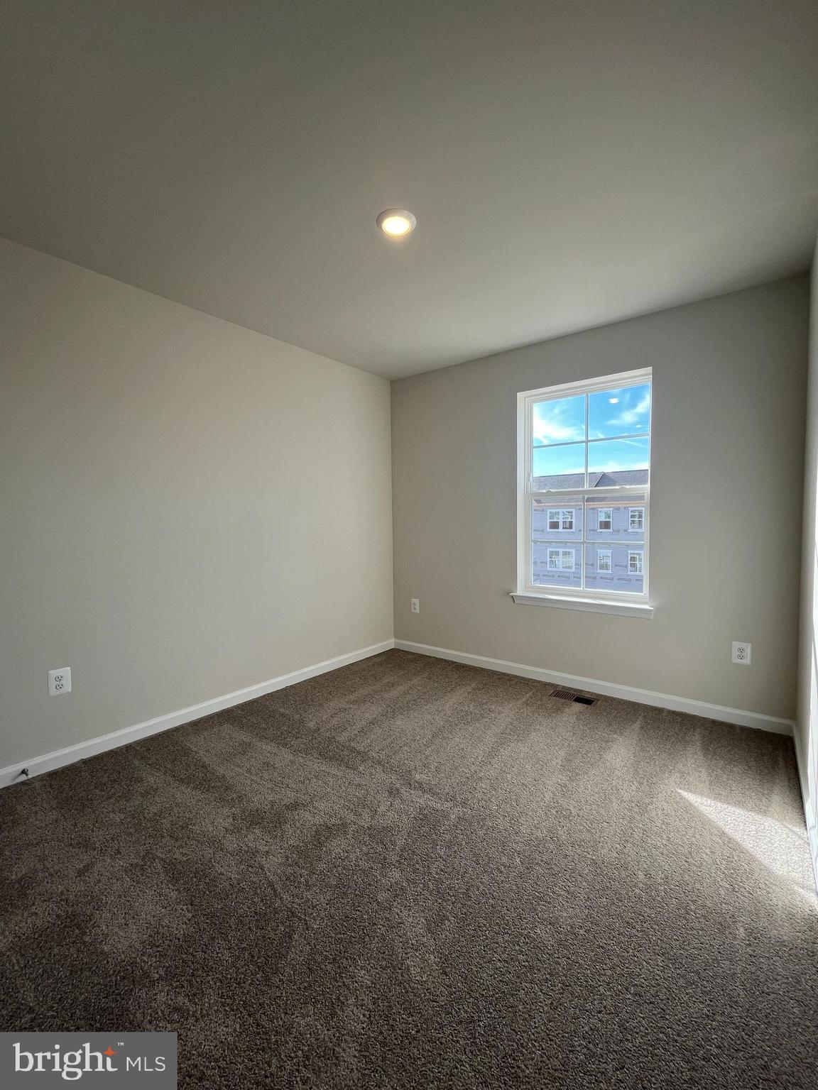 121 Canning Road Inwood, WV 25428 - Photo 27 of 38 an empty room with a window